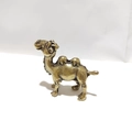 Vintage brass Bactrian camel figurine with detailed muscle textures and a bronze finish - Cartoon Camel / Bronze
