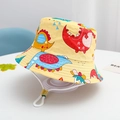 Detail of yellow kids bucket hat with colorful dinosaur prints and adjustable chin strap - Size 50/1-3 Years / Orange-Animated Dinosaur