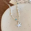 Detalle del colgante de estrella de mar con conchas naturales y collar de cuentas - 4# Collar-Blanco (Colgante de Estrella de Mar Relieve Lunares Cuentas)