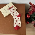 Festive beige cotton socks with red floral pattern and ruffled edges in a cozy Christmas theme - One Size / Flower Ruffle