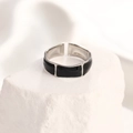 Close-up of silver adjustable ring featuring three black enamel rectangle geometric details - Adjustable Open / Silver Black Onyx