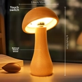 Warm glowing mushroom-shaped LED night light crafted from natural solid beechwood - Rotating Mushroom Light