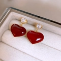 Elegant red enamel heart earrings with sparkling zircon studs on velvet jewelry tray - Double Layer Heart Pendant / Red Gold Heart (63# Silver Pin)