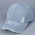 Detailed view of frayed distressed edges and stitching on a light blue denim baseball cap - M (56-58cm) / Light Blue