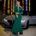Detail of dark green evening dress featuring asymmetrical silver sequin wave patterns - S / Green
