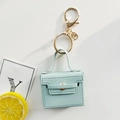 Hellblauer Kunstleder Mini Handtasche Schlüsselanhänger mit goldener Hardware und Textur - Hellblau