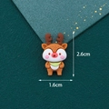Cartoon resin reindeer charm for DIY crafts with 2.6cm height and green scarf detail - Elk