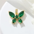 Exquisite 14k gold butterfly pendant with emerald zircon crystals on white tray - H-10944 Emerald Butterfly
