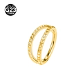 Golden double-layered G23 titanium nose ring with pyramid stud texture on a white background - Gold Without Stone