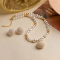 Detail of baroque pearl necklace and ball studs with gold-toned beads on ivory background - Gold Pearl Circle Ball Set