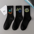 Three pairs of black cotton sports crew socks with colorful street graffiti smileys - 3 Pairs (Styles 17, 18, 28)
