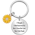 Detail of stainless steel keychain with sunflower charm and funny engraved text - I Thought I Had Social Anxiety But it Turns Out I just Don't Like People