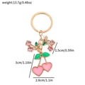 Portachiavi a ciliegia dorato con ciondoli a cuore in smalto rosa e foglia verde - Ciliegia Smaltata a Forma di Cuore Rosa (KC2417)