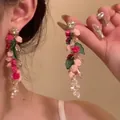 Vista detallada de pendientes de rosas vintage con cuentas de cristal y borlas largas - 6# Pendientes de Borla Larga de Rosa Rosa