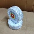 Two rolls of white pearl head sewing pins with yellow labels on brown background - White