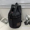 Zaino cilindrico in tela grigio scuro ad alta capacità con coulisse e logo in pelle - Nero Piccolo