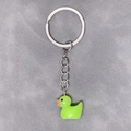 Close-up of a neon green resin duck keychain with a silver metal ring on gray background - 28mm Ring / Green