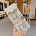 5-piece gold hair clip set with rhinestone bow, camellia, and pearl bear accents - Bowknot Flower 5-piece Set