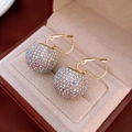 Detailed close-up of golden hoop earrings featuring vibrant multicolor crystal pave spheres - Ear Buckle-Colorful