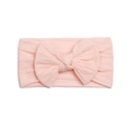 Detailed texture of baby nylon headband with large light pink twisted knit bow - Light Pink