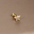 Macro shot of gold flower cartilage stud featuring five marquise zircon petals and ball screw back - Gold White Zirconia (Flower)