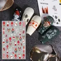 Detail of Christmas nail art stickers featuring elves, reindeer, and snowflakes model F991 - F991 (Bare Sheet)