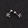 Detail shot of umbrella-shaped stud earrings with zircons and ball screw backs - Umbrella - Steel