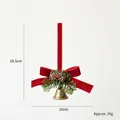 Christmas pine cone ornament with red velvet bow and bell, 18.5cm height dimension view - Red Rope Trumpet Bell