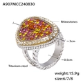 Anillo de acero de titanio con cara triangular engastada con pedrería rosa naranja y amarilla - US 6 / Color acero