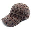 Detail view of brown plaid baseball cap featuring embroidered black bow patterns - M (56-58cm) / Coffee