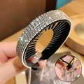 Glinsterende zwarte haarklem met zilveren strass-kwastjes voor een elegante knot - Zilver