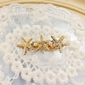 Pinza para el pelo de estrella de mar dorada con perlas y strass sobre encaje blanco - Pinza pico de pato estrella de mar / Dorado