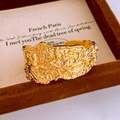 Macro shot of gold wide open cuff bracelet with vintage branch lava texture on velvet tray - Gold Irregular Lava Crumple Bangle (51#)