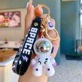 White astronaut keychain with purple accents, metallic silver visor and space wrist strap - Purple Large Astronaut (A0538)
