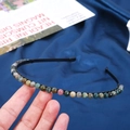 Detail of 6mm natural crystal stones hand-set on a sleek black metal headband - 6mm Indian Agate