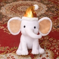 Plush white baby elephant toy wearing a gold and white Christmas hat variant - Christmas Gold Hat