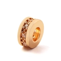 Macro shot of 18K rose gold plated copper spacer bead with cubic zirconia stones - White Zircon (Rose Gold)