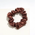 Detail view of smooth dark brown satin fabric scrunchie with soft pleated texture - Small Satin Red Brown