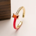 Detailed macro of 18K gold plated ring with red enamel and orange rectangle zircon - Adjustable Open / Red