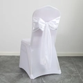 White spandex chair cover featuring a matching satin bow decoration for wedding banquets - White