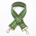 Detail of adjustable 5cm wide jacquard bag strap with green ethnic geometric patterns - No. 5 Bright Green