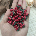 Miniature cherry charm for DIY jewelry held in hand to show the actual small size - Cherry