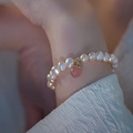 Elegant natural freshwater pearl bracelet with a pink peach charm and golden clasp - 12# Peach Pendant Bracelet - White