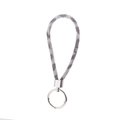 Detail view of a black-silver gradient braided strap keychain with silver metallic finish - Black White Snake Pattern