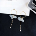 Detail view of long butterfly drop earrings with blue frosted wings and hanging pearls - Light Blue Butterfly Wing Artificial Pearl Tassel Style (E2687)