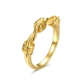 Minimalist gold knotted titanium steel ring for men and women on a clean white background - Size 6 / Gold
