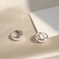 Pair of silver-tone hoop earrings with cubic zirconia on champagne silk fabric - Smooth Teardrop / White Gold