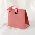 Pink textured paper gift bag with salmon finish and elegant satin ribbon handle - 15.5*14.5*7.5cm / Pink