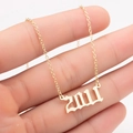 Golden stainless steel year 2011 necklace with Old English font on a cross chain - 2011 / Gold
