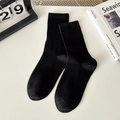 Classic black mid-calf cotton sports socks with a ribbed texture and minimalist design - One Size / Black